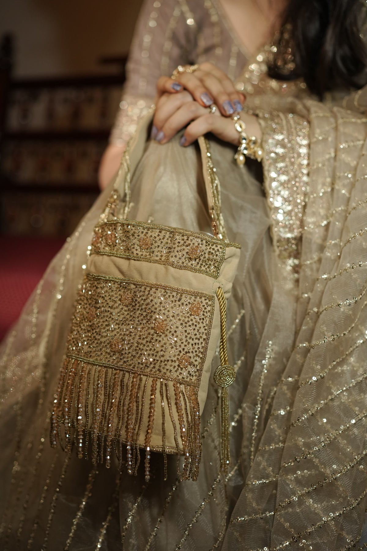 Zariya Gold Fringe Potli Bag