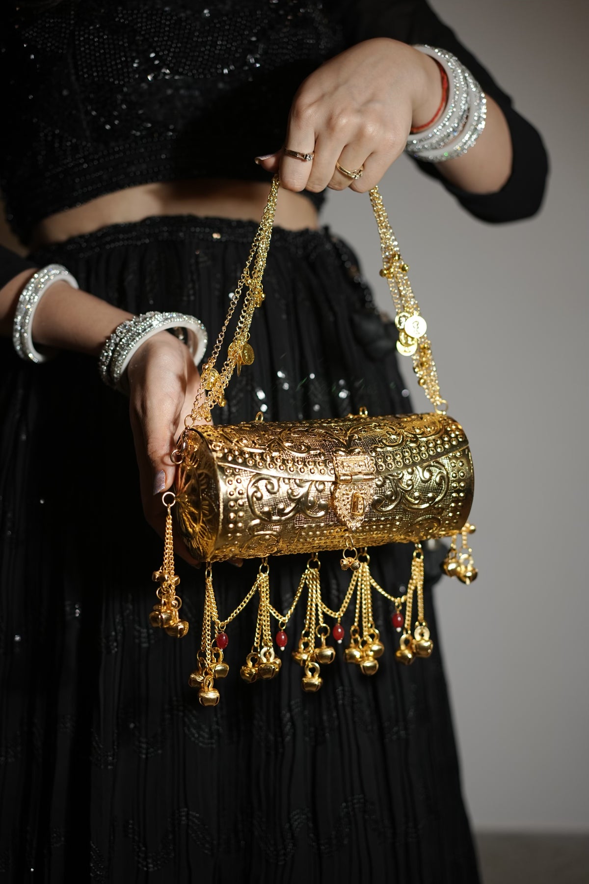 Aarohi Antique Gold Metal Trunk Clutch